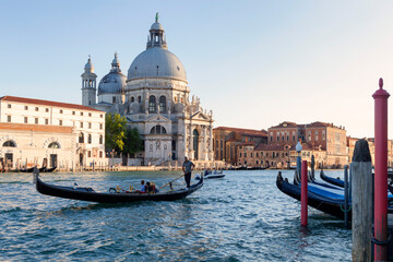 Fototapeta na wymiar Venezia. Gondole sul Canal Grande con La Salute