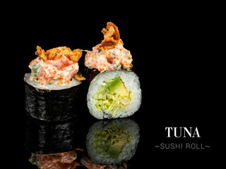Close up to sushi roll pieces with mirror reflection on black background. Sushi roll with lettuce, cucumber and avocado, tuna on top. Ready menu advertising banner with text and copy space.