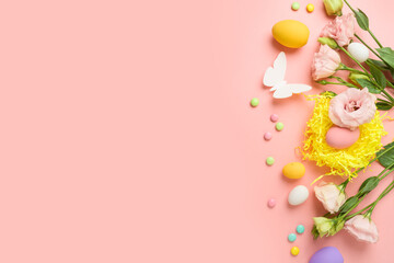 Easter holiday concept with easter eggs and spring  flowers on pink background. Top view, flat lay