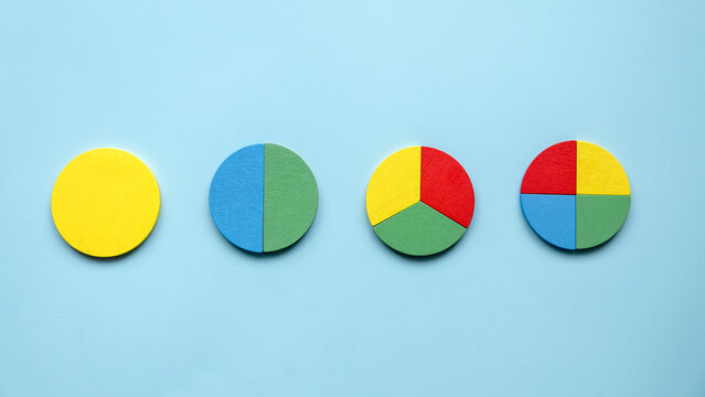 Colorful different shape of wooden pie chart pieces. 