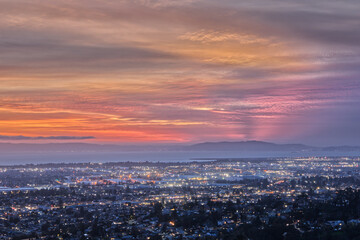 Fototapeta na wymiar Cloudy Purple Sunset Over San Francisco Bay Area