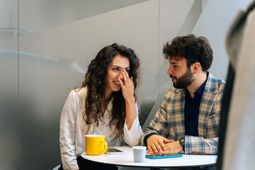 Young business couple having a fun conversation