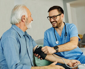 nurse doctor senior man health care help  retirement home hospital nursing caregiver blood pressure...
