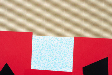 corrugated paper, red cards, and blue pattern