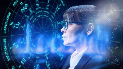 Serious woman consulting on horoscope sign, astrological forecast