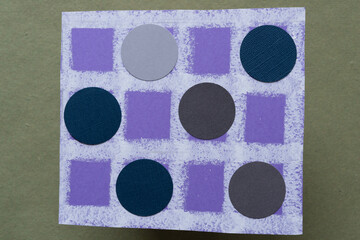 isolated purple paper grid with rough lines and paper circles