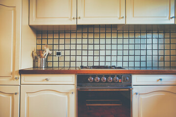 Vintage retro kitchen with green pattern tiles, american retro kitchen home interior design 70's...