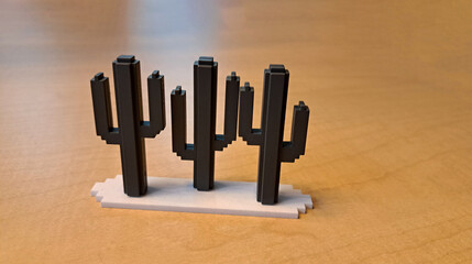 three cactus in blocks, color black