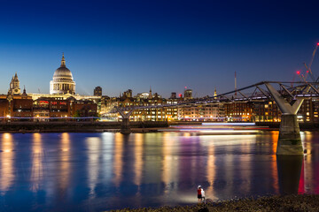 Fototapeta premium St Paul's Cathedral and Millennium Bridge in London at night