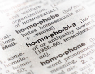 closeup of the word homophobia - obrazy, fototapety, plakaty