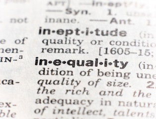closeup of the word inequality