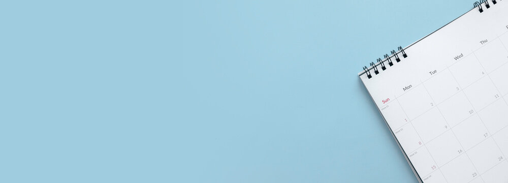 Concept of plan a monthly calendar for meetings or manage your daily activities.Blue banner. Copy space.