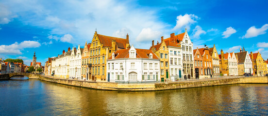 Fototapeta na wymiar Panoramic view of Brugge old town and water canal, wide angle photo