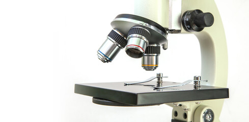 Fototapeta na wymiar Microscope isolated on white background