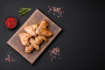 Baked chicken wings with salt, spices and herbs