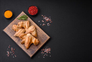Baked chicken wings with salt, spices and herbs