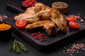 Baked chicken wings with salt, spices and herbs