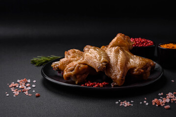 Baked chicken wings with salt, spices and herbs