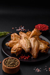 Baked chicken wings with salt, spices and herbs