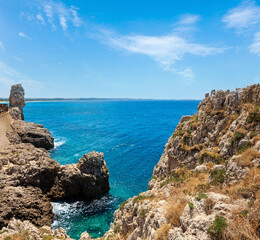 Fototapeta na wymiar Picturesque Ionian sea coast near Montagna Spaccata rock, Santa Maria Al Bagno, Gallipoli, Salento, Puglia, Italy.