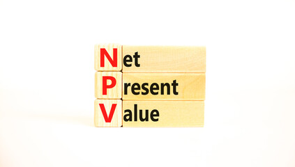 NPV net present value symbol. Concept words NPV net present value on wooden blocks on a beautiful white table white background. Business and NPV net present value concept. Copy space.