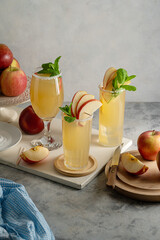 Apple cider, cocktails drink with fresh red apples, summer refreshing drink.