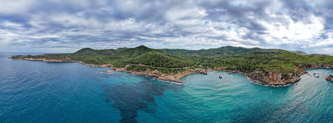 Aerial photographs of the beaches of Cala Xarraca , on the island of Ibiza during a sunny summer...