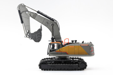 Backhoe hydraulic Excavator with bucket. side view. Wide angle. Isolated on white background.