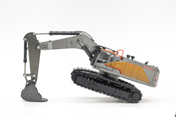 Backhoe hydraulic Excavator with bucket. side view. Wide angle. Isolated on white background.