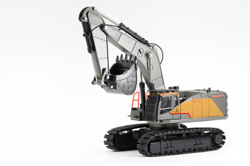 Backhoe hydraulic Excavator with bucket. side view. Wide angle. Isolated on white background. - 577809522