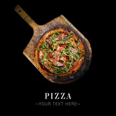 Foto op Canvas Above of classic Italian uncut Parma ham pizza with tomatoes, mozzarella cheese and fresh arugula leaves served on baking shovel. Cheesy pizza isolated on black background with text and copy space © Art Food