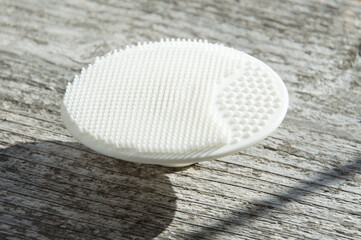 Gouache roll and scraper. High quality photo. wooden background