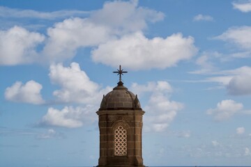 Cross in the clouds