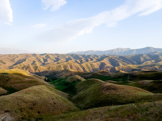 Beautiful foothills at sunset in Kyrgyzstan.