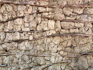 Wall of a house built of clay according to traditional ancient technology