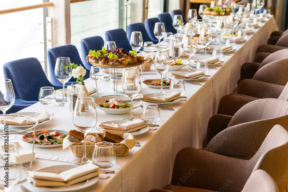 Wall mural served table in a restaurant for receiving guests