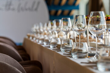 crystal glasses on a table for dinner