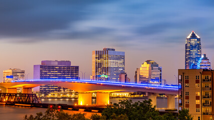 Long exposure of Jacksonville, Florida skyline and Acosta bridge spanning St. Johns river, at dusk....