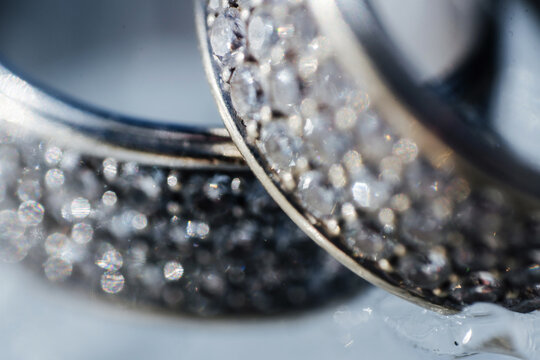 Bokeh of diamonds on the background of rings with glitter