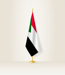 Sudan flag on a flag stand.