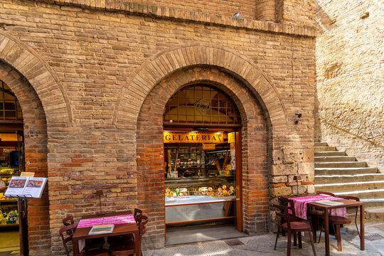 General view of the Caffe Combattenti Gelateria, one of the original gelato shops in the historic medieval Tuscan walled town of San Gimignano, Italy, on September 25 2022.