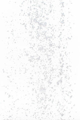 Photo image of falling down snow, heavy big small size snows. Freeze shot on black background isolated overlay. Fluffy White snowflakes splash cloud in mid air. Real Snow high speed shutter