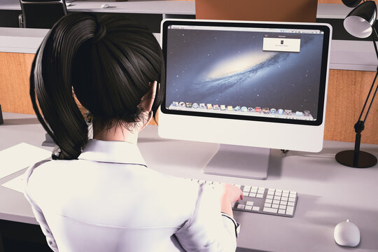 オフィスでパソコンのキーボードを打つ女性