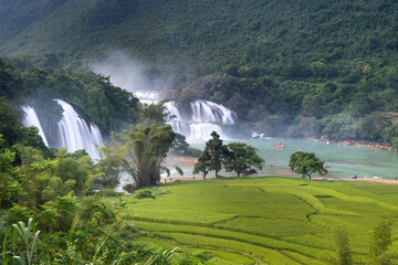 Ban Gioc Waterfall on a sunny beautifull day. This is the largest and most beautiful waterfall in...