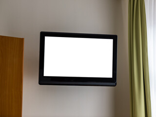 Blank TV screen as a mockup or template to insert a picture or video. Flat television mounted to a wall. Empty copy space for media content.