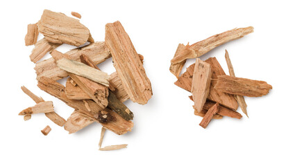 closeup of two piles of cedar or palo santo incense, wood chips isolated over a transparent background, top view / flat lay - 577874136