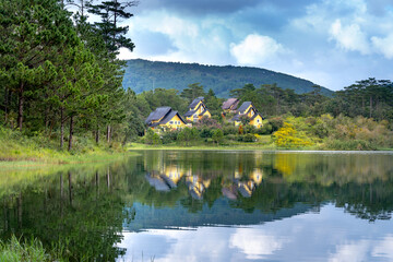 beautiful pictures of the three villas in Binh An resort reflecting on Tuyen Lam Lake