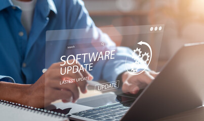 Man working and installing update process. Software updates or operating system upgrades to keep your device up to date with enhanced functionality in new versions and improved security.