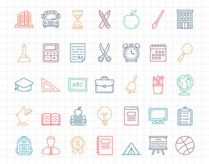 Set of colored school doodle icons on squared paper background