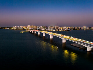 Evening aerial image of the Sarasota, Florida Skyline and Bridge Across Sarasota Bay